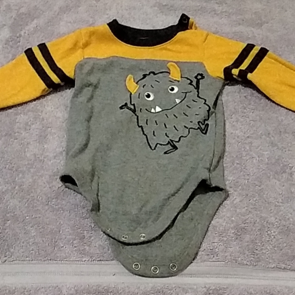 Long sleeve onesie with a monster